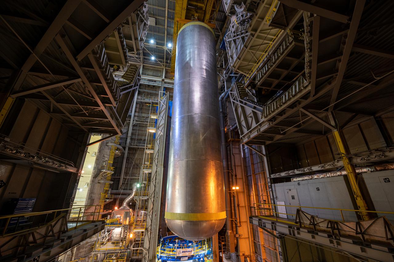 This image highlights the liquid hydrogen tank that will be used on the core stage of NASA’s Space Launch System rocket for Artemis II, the first crewed mission of NASA’s Artemis program. The tank is being built at NASA’s Michoud Assembly Facility in New Orleans. The SLS core stage is made up of five unique elements: the forward skirt, liquid oxygen tank, intertank, liquid hydrogen tank, and the engine section. The liquid hydrogen tank holds 537,000 gallons of liquid hydrogen cooled to minus 423 degrees Fahrenheit and sits between the core stage’s intertank and engine section. The liquid hydrogen hardware, along with the liquid oxygen tank, will provide propellant to the four RS-25 engines at the bottom of the cores stage to produce more than two million pounds of thrust to launch NASA’s Artemis missions to the Moon. Together with its four RS-25 engines, the rocket’s massive 212-foot-tall core stage — the largest stage NASA has ever built — and its twin solid rocket boosters will produce 8.8 million pounds of thrust to send NASA’s Orion spacecraft, astronauts and supplies beyond Earth’s orbit to the Moon and, ultimately, Mars. Offering more payload mass, volume capability and energy to speed missions through space, the SLS rocket, along with NASA’s Gateway in lunar orbit, the human landing system, and Orion spacecraft, is part of NASA’s backbone for deep space exploration and the Artemis lunar program. No other rocket can send astronauts in Orion around the Moon in a single mission.